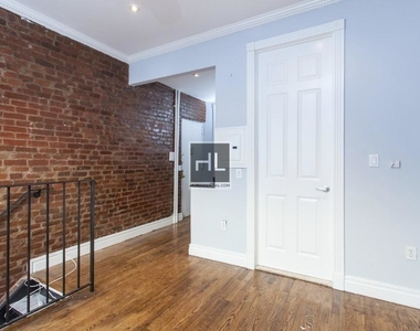 E 13th St. - Photo Thumbnail 1