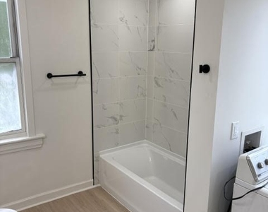 1615 Manhattan Street - Photo Thumbnail 9