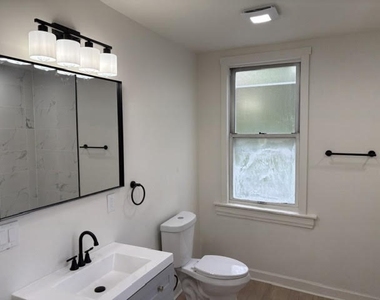 1615 Manhattan Street - Photo Thumbnail 8