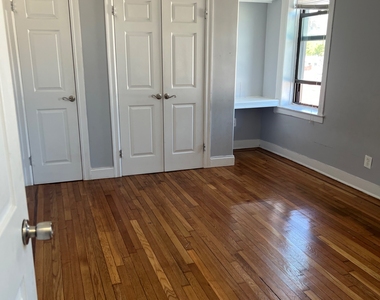 7022 Ridge Boulevard - Photo Thumbnail 1