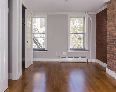 E 7th St. - Photo Thumbnail 1