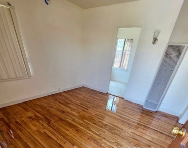 1402 W 78th Street - Photo Thumbnail 1