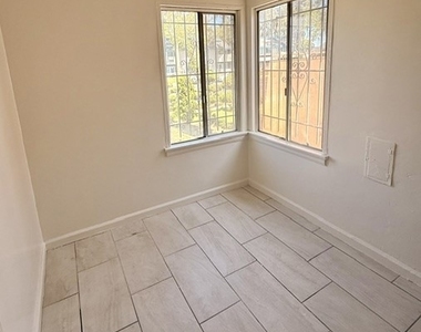 1402 W 78th Street - Photo Thumbnail 5