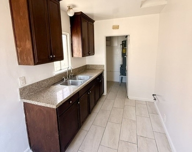 1402 W 78th Street - Photo Thumbnail 2