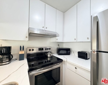 5805 W 8th Street - Photo Thumbnail 3
