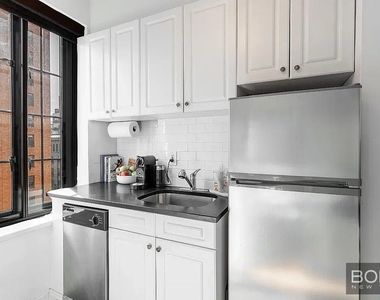 201 W 16th Street - Photo Thumbnail 3