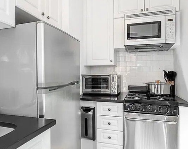 201 W 16th Street - Photo Thumbnail 4