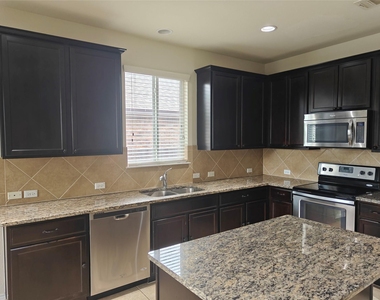 5610 Hopkins Dr - Photo Thumbnail 4