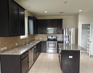 5610 Hopkins Dr - Photo Thumbnail 2