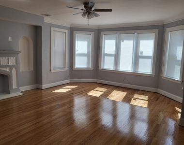 7307 S Bennett Avenue - Photo Thumbnail 1