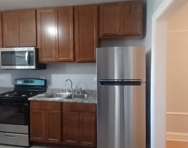 7307 S Bennett Avenue - Photo Thumbnail 7