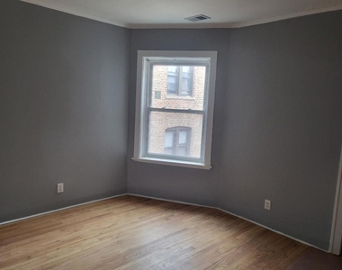 7307 S Bennett Avenue - Photo Thumbnail 3