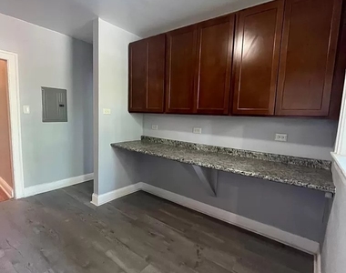 7307 S Bennett Avenue - Photo Thumbnail 8