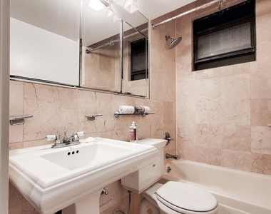 E 13th St. - Photo Thumbnail 2