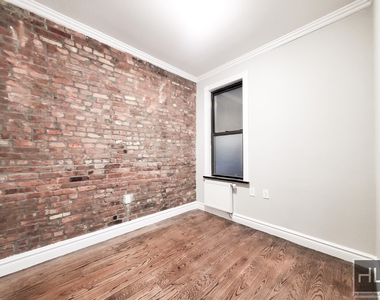 E 13th St. - Photo Thumbnail 6