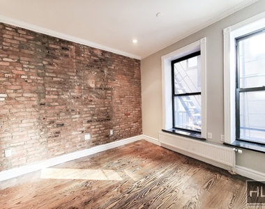 E 13th St. - Photo Thumbnail 5