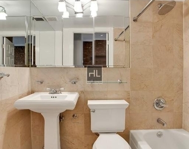E 13th St. - Photo Thumbnail 7