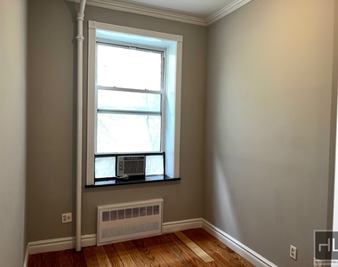 E 16th St. - Photo Thumbnail 4