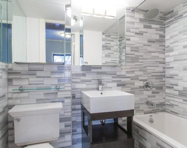 W 14th St. - Photo Thumbnail 3