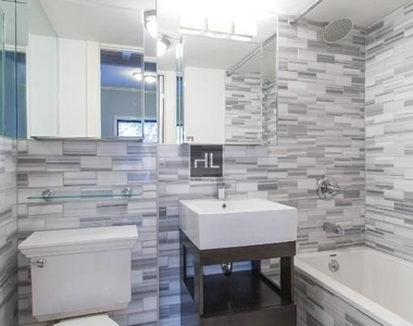 W 14th St. - Photo Thumbnail 9