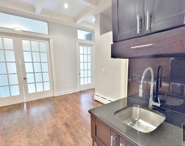 W 14th St. - Photo Thumbnail 1