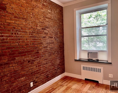 E 16th St. - Photo Thumbnail 5