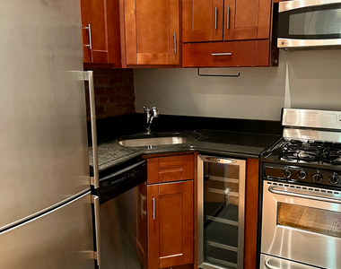 E 16th St. - Photo Thumbnail 1