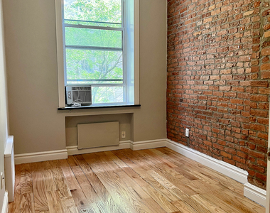 E 16th St. - Photo Thumbnail 3