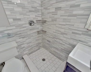 W 14th St. - Photo Thumbnail 4