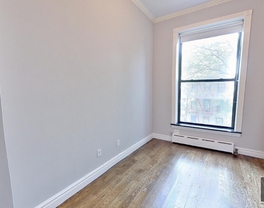 W 14th St. - Photo Thumbnail 5