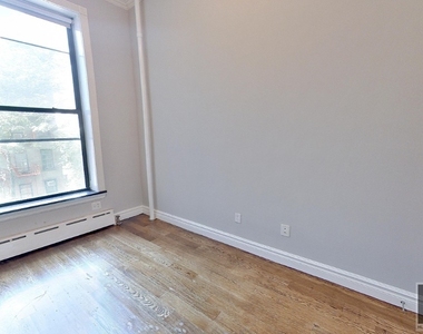 W 14th St. - Photo Thumbnail 7