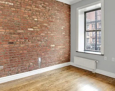 E 13th St. - Photo Thumbnail 6