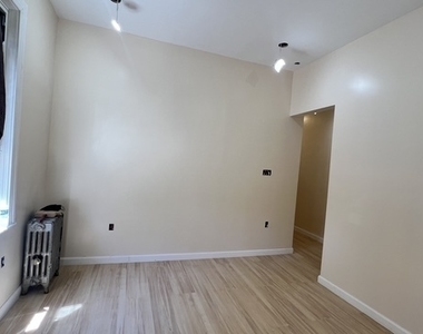 586 East 54 Street - Photo Thumbnail 1