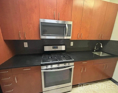 750 Onderdonk Avenue - Photo Thumbnail 1