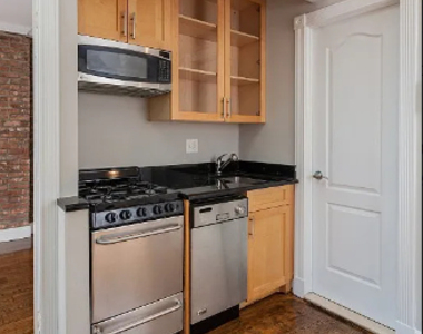 W 21st St. - Photo Thumbnail 4