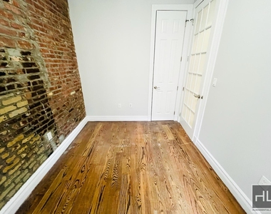 E 13th St. - Photo Thumbnail 4