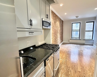 E 13th St. - Photo Thumbnail 6