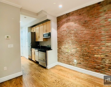 E 13th St. - Photo Thumbnail 1