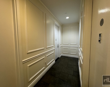 E 13th St. - Photo Thumbnail 9