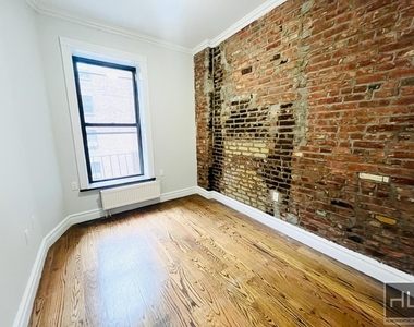 E 13th St. - Photo Thumbnail 5