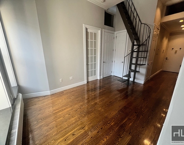 E 13th St. - Photo Thumbnail 2
