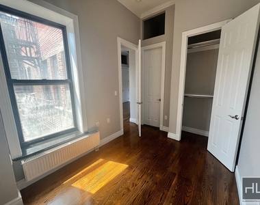 E 13th St. - Photo Thumbnail 5