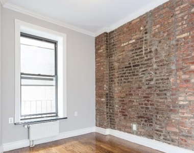 E 13th St. - Photo Thumbnail 2