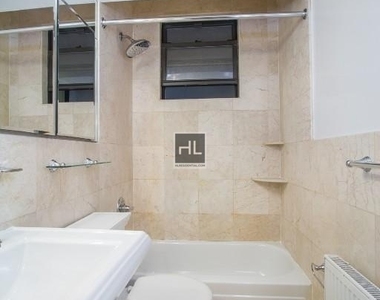 E 13th St. - Photo Thumbnail 1