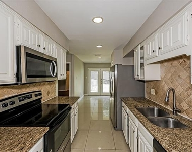1217 Meadow Creek Drive - Photo Thumbnail 7