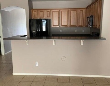 17748 W Desert Bloom Street - Photo Thumbnail 8