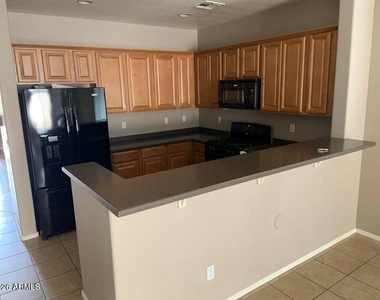 17748 W Desert Bloom Street - Photo Thumbnail 7