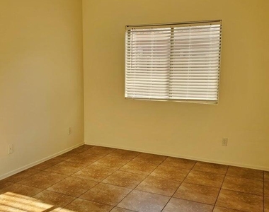 8458 E Edgewood Avenue - Photo Thumbnail 1