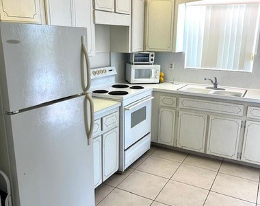 1455 N 12th Court - Photo Thumbnail 2