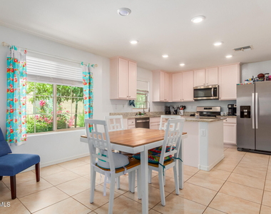 8216 W Albeniz Place - Photo Thumbnail 4